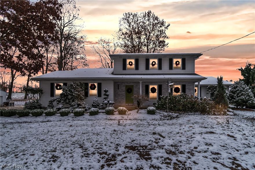 Upon entering this 4 bedroom, 2 ½ bath custom Colonial situated on approximately 3.9 acres you sense the serenity of this secluded home.  Stroll through the living room where you have views to the north towards Quail Hollow Park. The Dining room connects to the living room which through a sliding door  has access to the covered rear patio. To the right of the living room is the first floor master bedroom with a master bath complete with jetted tub, separate shower, walk-in closet. Off the Dining room is the magnificent kitchen featuring granite counter tops, SS appliances, recessed lighting and open flow into the family room. The family room features electric fireplace, sliding glass door to the covered patio.  There is an office located to the rear side of the house near the drive with separate entrance to a brick patio and driveway. Finishing the first floor is a half bath and laundry room complete with sink and ample storage cabinets.  Second level offers 3 large bedrooms ,one with