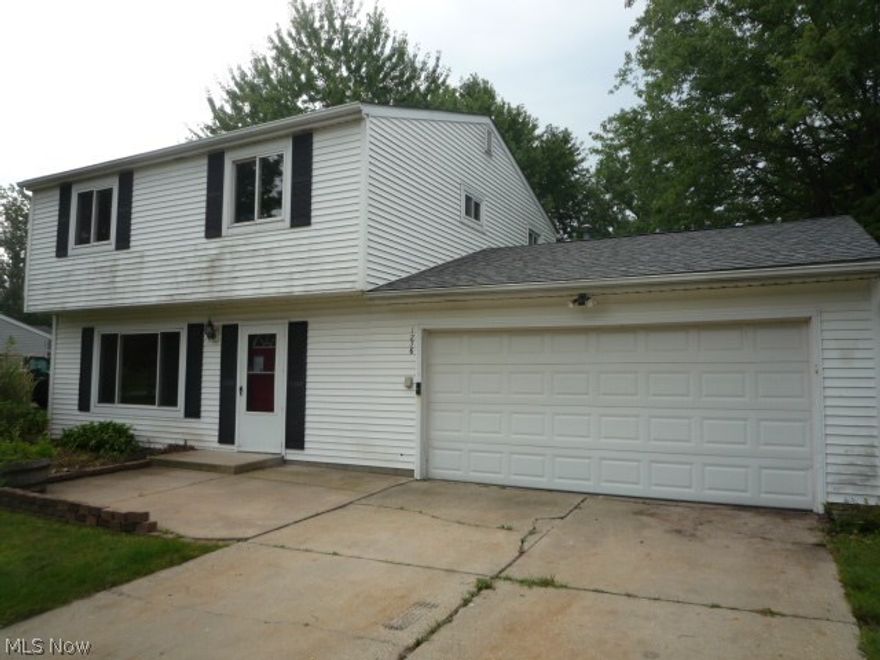 Spacious Streetsboro Colonial.  3 BR, 1.5 Bath and 2 Car Garage on nearly a 1/2 Acre Lot!  Deck and Enclosed Deck Room.  Level Fenced Yard and Storage Shed.  This is a Fannie Mae HomePath Property.