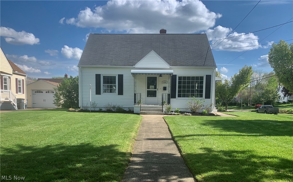 Adorable Cape Cod completely updated on a corner lot. Eat in kitchen features new white cabinetry with butcher block countertops, new stainless gas range and dishwasher, luxury vinyl plank flooring, black subway tile backsplash, black lighting and hardware. The living room has a beautiful picture window, accent wall, new carpet and paint and window treatments. The full bathroom has been remodeled with a beautiful black and white design with yellow accents. Two bedrooms on the first floor for first floor living. The upstairs has a third bedroom with hardwood flooring and a second brand new half bathroom with barn style doors. There is a full basement with a washer and dryer. Extra wide one car garage with concrete driveway. concrete walkway to the side and front doors plus a covered front porch. Check out the new landscaping that compliments the perfect green grass.