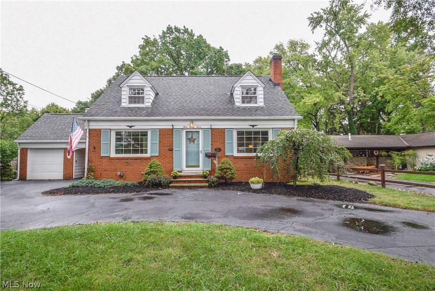 Attractive Berea Cape Cod ..... Stunning Curb Appeal .... Lots Of Charm And Character .... Large Park Like Lot .... 3 Bedrooms, 2 Full Baths .... Gleaming Hardwood Floors Throughout .... Spacious Rooms .... Beautiful Living Room With Cozy Fireplace .... Newer Windows And Roof .... Large Deck And Sun Porch Overlook The Sprawling Back Yard .... Full Basement .... Wrap Around Driveway .... Central Air ! .... Don't Miss This One !