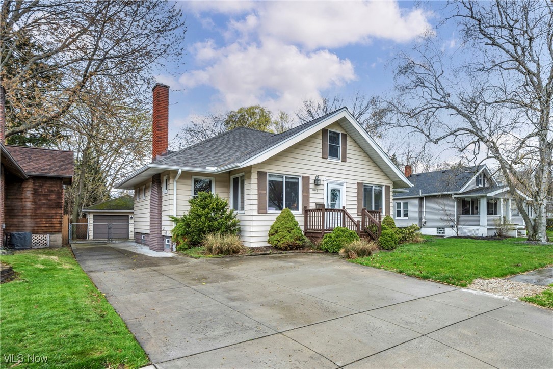 This is the one you have been waiting for! Welcome to this lovely move-in ready home with 4 bedrooms, 2 full bathrooms, and charm and character throughout. As you enter through the front sunroom you will love the bright and open first floor. Natural light flows through this cozy space and right into the large family room featuring a tiled fireplace with a mantle and recessed lighting. The family room flows right into the wonderful dining area which is open to the kitchen – perfect for entertaining! The kitchen provides ample workspace, wood cabinets with tons of storage, and stainless steel appliances. Off the kitchen is a mudroom area that also leads you out to the huge backyard and awesome patio space. On the first floor are two spacious bedrooms and a full bathroom. Upstairs you will find the primary bedroom as well as a fourth bedroom complete with custom built shelves and storage (2022) and another full bathroom, as well as bonus storage spaces. The basement includes a large rec room with a bar area, a flex room with a closet that could be finished for an extra guest room, playroom, gym, or office, and a laundry and storage room. The backyard is fully fenced for privacy with patios and an abundance of yard space – what a gem! The roof and gutters were just replaced in March 2025 and central air conditioning was added in 2022! This home is the one, and is in such a great neighborhood close to everything!
