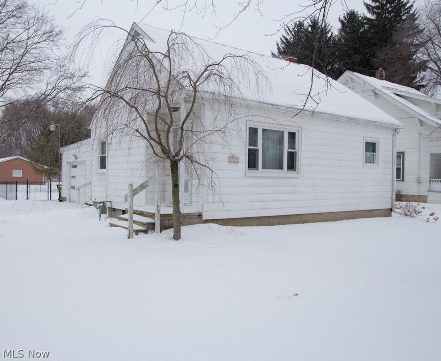 What a surprise when you walk into this beautifully updated bungalow at 3901 Edison Street NW in Uniontown, Ohio! So much room! Generous living room offers a large double coat/utility closet. The master bedroom, and a full bath are on the first floor. Fully applianced kitchen opens to the dining room. First floor laundry/mudroom gives access to the partially finished enclosed porch, and also to the one car attached garage. The second floor offers two more bedrooms. The lower level has recently been finished in 2016, providing a recreation room. So many updates include, windows in the living room, and on the second floor 2013, windows in the dining room, master bedroom, and bathroom 2017, roof 2014, hot water tank 2015, back yard fencing 2016. New electric service with 150 amp installed 2017. The laundry room cabinets and sink were installed in 2016. New garage door Jan. 2017.  This home is adorable, and very functional! Hurry, it wont last long!