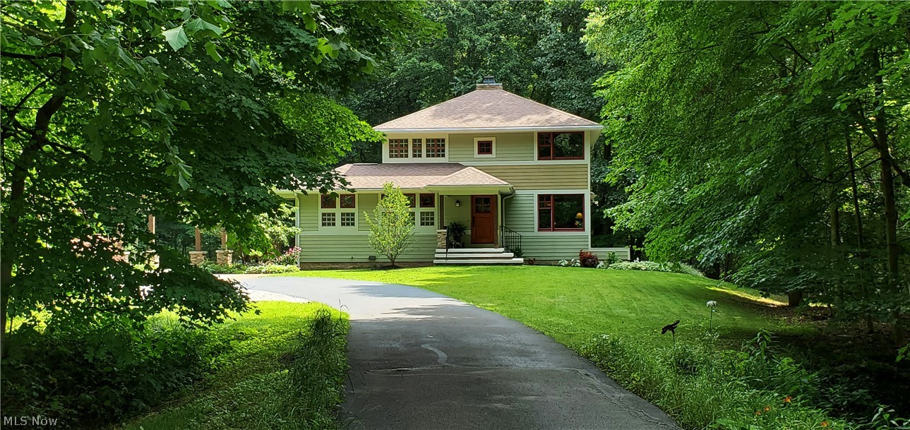 Nestled at the end of a cul-de-sac, down a 1,500 ft driveway sits this modern Arts & Crafts treehouse on 4 acres. The beauty of nature is on display where you will wake up to birds singing in the tree canopy with breathtaking views! This multi-faceted gem was uniquely designed for today’s live, work, and play-from-home lifestyle while immersing yourself in nature! This home features multifunctional spaces, a reading nook, dark room, ample storage along with a 4 car garage. Strategically located to easily access the civic, recreational & cultural amenities that are a 10-minute drive to downtown Akron or 35 minutes to downtown Cleveland. Enjoy your Saturdays with a morning bike ride to Howe Meadow Farmers Market, 4 miles to Blossom Music Center, or 5 minutes to Highland Square. All of the Cuyahoga Valley is your playground! This ONE-OF-A-KIND home was built with sustainability in mind including site selection & orientation to protect habitat. Locally sourced materials & craftsmanship. En