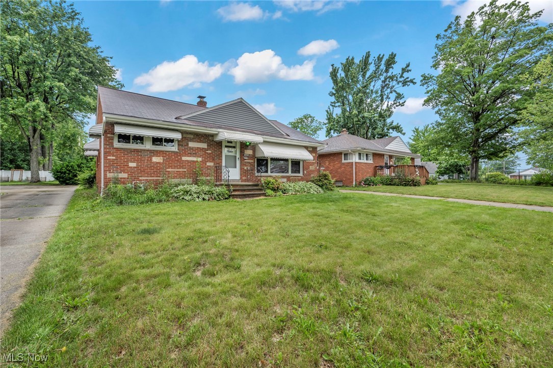 Immediate occupancy available with this beautifully remodeled (2023) light-filled 3-bedroom, 2-full-bath brick ranch, perfectly situated in a desirable neighborhood! From the moment you arrive, you’ll appreciate the updated, energy-efficient vinyl windows and attractive brick curb appeal. Garage includes a screened-in porch area that’s sure to become your go-to spot for summer relaxation or entertaining. Inside, you’ll find a no-carpet home—only gleaming hardwood floors and stylish luxury vinyl wood tile for both aesthetics and durability. The spacious yet inviting living room is filled with natural light, enhanced by classic cove ceilings for an added touch of charm. The all-new white shaker-style kitchen is a dream for cooks and entertainers alike, featuring stainless steel appliances (including a gas range), custom tiled backsplash, and a convenient pantry cabinet. The cheerful owner’s suite offers three windows for abundant natural light and comfort. The full open basement has been professionally waterproofed and is ready to serve as rec space, storage, or even future expansion. Major updates include modern HVAC, a 2021 hot water tank, and updated plumbing and electrical. Everything has been done—just move right in and enjoy worry-free living in this stunning home!