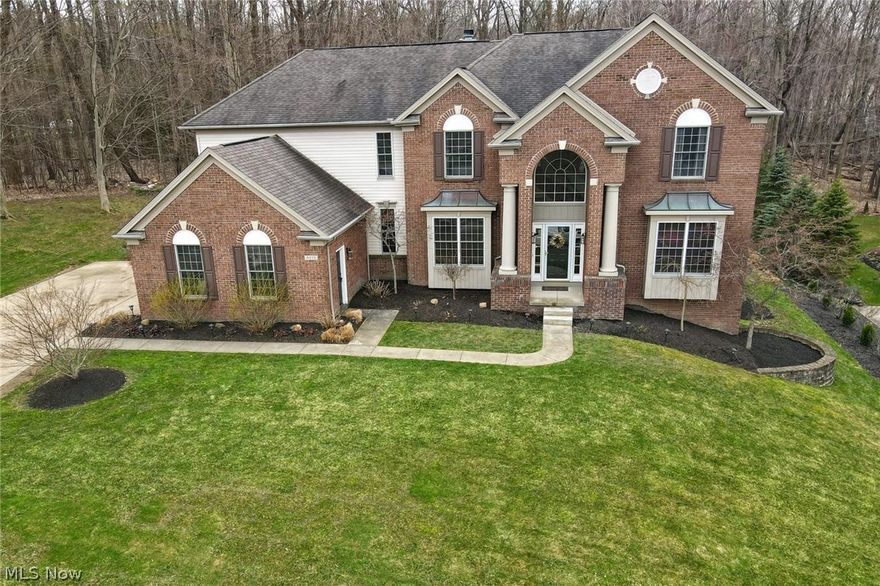 ABSOLUTELY STUNNING. Pride of home ownership displays throughout the whole house & will not disappoint. Holden Ridge development this stunner has so much to offer. Colonial has 4 bedrooms, 6 baths & over 5,900 sq ft of living space. The entrance to the foyer is very welcoming & has an incredible staircase. This massive kitchen has everything you need w/ stainless appliances, double oven, huge island, Corian countertops, beautiful flooring & sliders that lead out to a spacious deck w/ plenty of privacy. Large living room w/ high ceilings & fireplace. The 1st floor offers a formal dining area, office located off the back wing & a sitting room. 2 half baths & the laundry room equipped w/ double washer & dryer on main floor. Upstairs you will find the desirable master bedroom that has a master bath with walk-in closets, soaking tub & 2 separate vanities. The other bedroom has stunning floors with a full bath & walk-in closet. 2 bedrooms across the walkway share a jack/jill bathroom & large