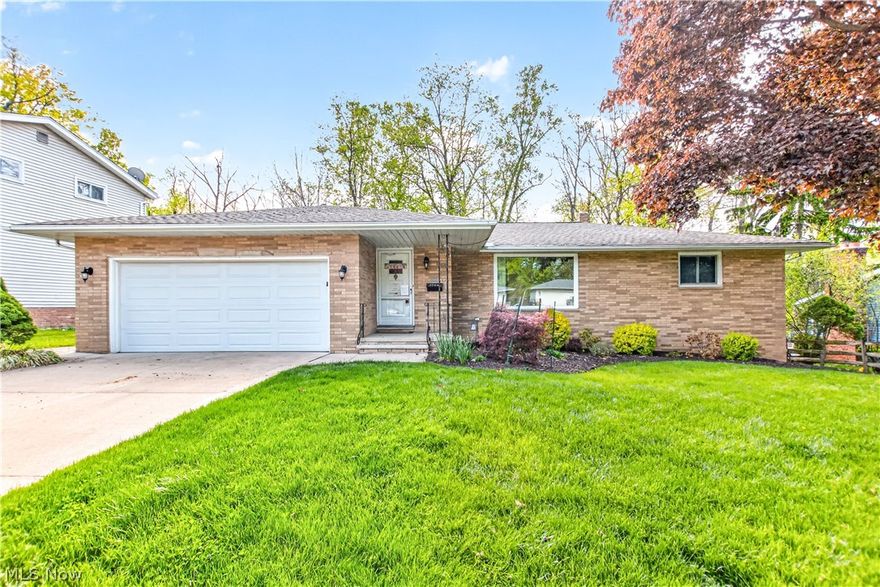 Gorgeous 3 Bedroom 1.5 Bath Brick Ranch Located In A Sought After Neighborhood In Parma. Newer Roof, Windows & Central Air. As You Step Inside You Can Feel The Love Of All The Wonderful Family Memories Made Here Over The Years From Sunday Dinners To Game Nights To The Annual Holiday Cookie Making Tradition. Beautiful Hardwood Floors Flow Throughout The Spacious & Open Concept First Level! Fantastic Updated Kitchen Features Newer Cabinets, Counters, Double Sink, Faucet, Ceramic Flooring & Stainless Steel Appliances Which Leads To Your Expansive Formal Dining Room Comfortably Accommodating A Table Big Enough For 12! Relax In Your Cozy & Private Living Room Which Offers A Gas Fireplace, Plenty Of Room for Movie Nights And a Slider To Your Deck. Entertain Loved Ones & Friends In Your Large 20X13 Family Room Which Boasts A Huge Picture Window Offering A Plethora Of Natural Light! Remodeled Full Bath Includes Newer Ceramic Flooring, Faucet, Sink & Tub Surround. Half Bath Has Newer Ceramic Flooring, Vanity, Faucet, Sink & Toilet. A Generous Sized Master Bedroom With Double Closets & Two Additional Bedrooms Round Out This Level. In Your Enormous Lower Level Basement You Will Find A Newer Furnace, Glass Block Windows, Updated Electrical Panel, Standup Shower, Tons Of Storage & Convenient Workshop With Walk-Out Access!! Enjoy Lovely Days Grilling On The Back Deck That Overlooks Your Peaceful And Serene Park-Like Setting Rear Yard. 2 Car Attached Garage! Newer Ceiling Fans & Light Fixtures! This Stunning Beauty Has It All! Come Make This Truly One Of A Kind Warm And Loving Family Home Yours Today.