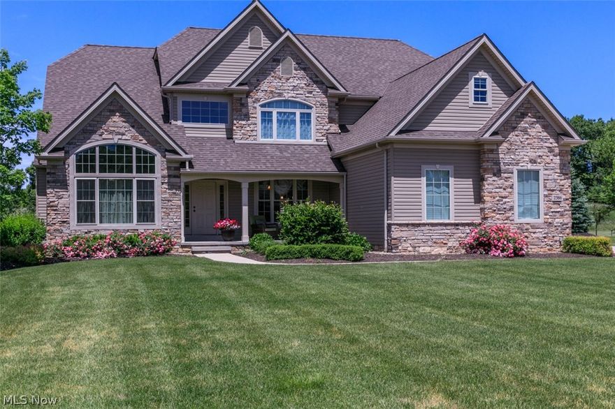 This stunning, original owner, contemporary style home with four bedrooms and three full and one half bathrooms sits on one acre in the highly desirable Pine Valley development. The main floor has an open floor plan featuring the great room with a vaulted ceiling and beautiful stone fireplace. The open kitchen has an eat in area, plenty of natural light, recessed lighting, granite countertops and center island with breakfast bar. Slider off the kitchen leads to the deck, patio and large back yard, perfect for entertaining. First floor owners suite offers a large glamorous bath. Second floor includes two bedrooms and an additional owners suite with full bath, his/her walk in closets and a tandem room perfect for a nursery, office or playroom. Beautiful woodwork throughout. Full lower level is unfinished and has unlimited possibilities and is plumbed for a full bath. First floor laundry room leads to spacious three car heated garage with hot and cold water. Conveniently located close to