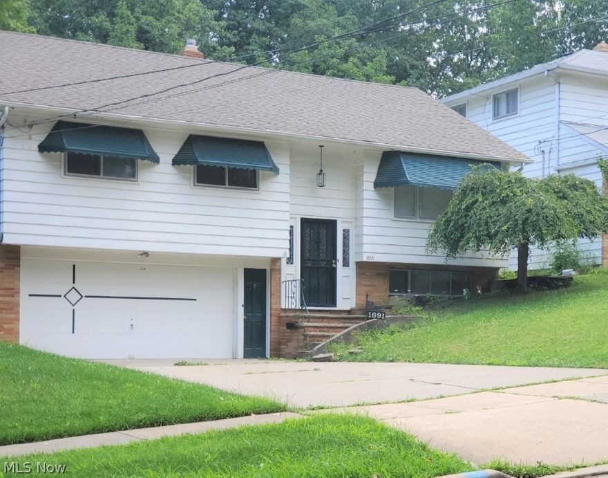 Move in ready!! Beautiful split level located in Euclid, close to public transportation and Euclid Creek Park. Granite counter tops throughout the kitchen. You can  walk right out to the deck through the sliding doors off the dinning room. Brand New stove and refrigerator in 2020. Newer lighting fixtures throughout the home. Attached 2 car garage with opener. In the lower level you can enjoy family movie nights in the finished recreation room. It features a 2nd bathroom complete with stand up shower. Outside features a shed with electricity. Newer Furnace and air conditioner.