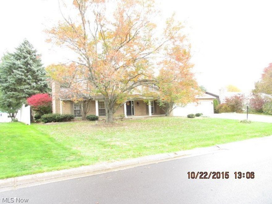 Cramped? Need Room? Family Life Thrives In This FIVE Bedroom, FIVE Bath  Brick Home and 3-Car Attached Garage. TWO Master Bedrooms With Private Baths And One Being Located On 1st Floor.  Kitchen Has New Cupboards, Counter and Vinyl Flooring...Family Room With Fireplace...Large 1st Floor Laundry...Huge Sunroom...Foyer...1/2 Bath For Quests...Bedroom With Private Full Bath on First Floor. 2nd Story Offers 4 More Bedrooms and One With Private Bath...Another Full Bath.  Lower Level Has Big Recreation Room and 1/2 Bath and NOT Included in the 2866 Sq.Ft. Large Covered Front Porch. Freshly Painted and New Carpet Through-out With Exception Of Lower Level. See This and STOP Looking!