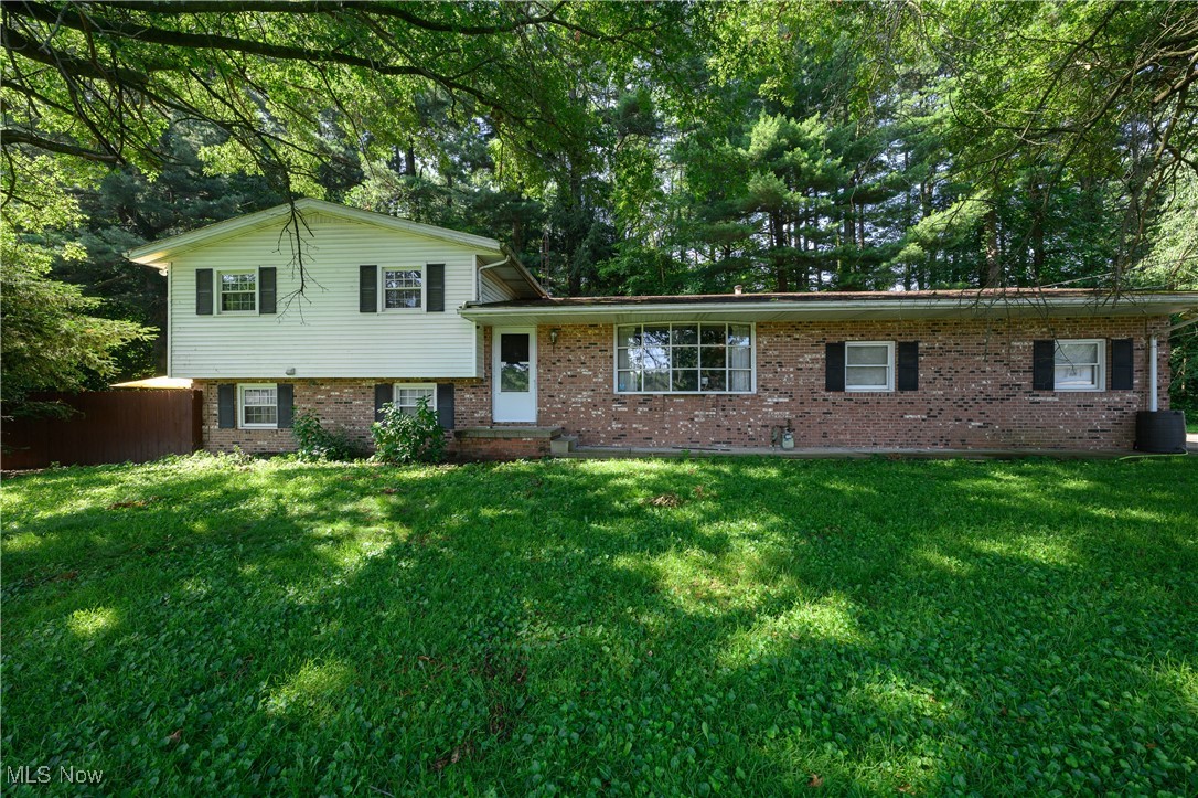 Welcome to this beautifully maintained 3-bedroom, 2- bathroom home nestled in the peaceful Plain Township. Sitting on a spacious.77 acre lot, this 1,716 square foot property offers a peaceful retreat with a private fenced in side yard, a creek, and a backyard forest. This home is a nature lover's dream.
Step inside to discover an open concept layout that seamlessly connects the living room to the stunning eat-in kitchen. The heart of the home features new luxury vinyl flooring throughout much of the home, and freshly painted walls giving it a clean and modern feel. The home features two separate living areas including a cozy den with a wall-to-wall fireplace and a view of your own forest, while the other space would make the perfect library or family room highlighting its original bay window. Additional highlights include:
• Two car garage with a large driveway
• Cement patio overlooking your private fenced in backyard
• Spacious dining room and kitchen ready for your finishing touches
• Large basement perfect for storage
• Laundry room including washer and dryer
• Bonus office space with patio access
• Kitchen appliances included
Located just one mile from Gervasi Vineyard and Oakwood Square you'll enjoy easy access to dining, shopping and entertainment. There are lots of local parks and trails, including a dog park just 2 minutes away! Plain local schools are just around the corner making this an ideal location for families.
With great bones and plenty of updates already completed, this home is ready for your personal touch to make it your own!