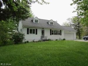 This charming well maintained 4 bedroom Cape Cod boasts a kitchen/dining room combination with a living room off the dining area and beautiful hardwood floors throughout. The upstairs holds 2 large bedrooms and a small office or nursery with a storage closet in the hallway. The 1.13 acre lot is septic approved. Geauga County POS inspection completed and septic system approved.
