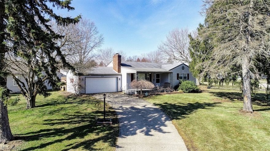 Motivated Sellers!! Home Warranty included with this beautiful 3 Bedroom Ranch on large corner lot in Youngstown's prime Conersburg Location. This ranch features a newly updated eat-in kitchen (2017) complete w/all new stainless steel appliances and wine & beverage refrigerator. All new flooring in kitchen, and newer carpet and original hardwood floors throughout rest of house. Spacious living room with fireplace and large Master bedroom with 2 additional bedrooms and full bath complete the main floor. Very large dry partially completed basement with full bath and additional living space and tons of storage. The outside includes a large deck with above ground pool. The large 2 car garage features a new door and opener (2018)  with remotes and another full refrigerator for additional space. A Beautiful covered porch add additional area to relax and enjoy the outdoors. Be sure to check in on this one before its gone!