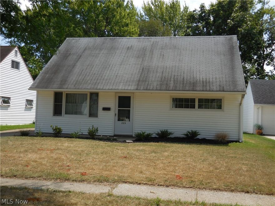 Move right in to this updated Cape Cod with large addition! Located in the heart of Berea! This home is bright and clean! Four Bedrooms and two full baths! Large Eat-In Kitchen! All appliances stay! Two car garage!  New carpeting throughout! Addition overlooks large backyard! Windows galore! Great residential area! Schools close by! Dont' miss out!