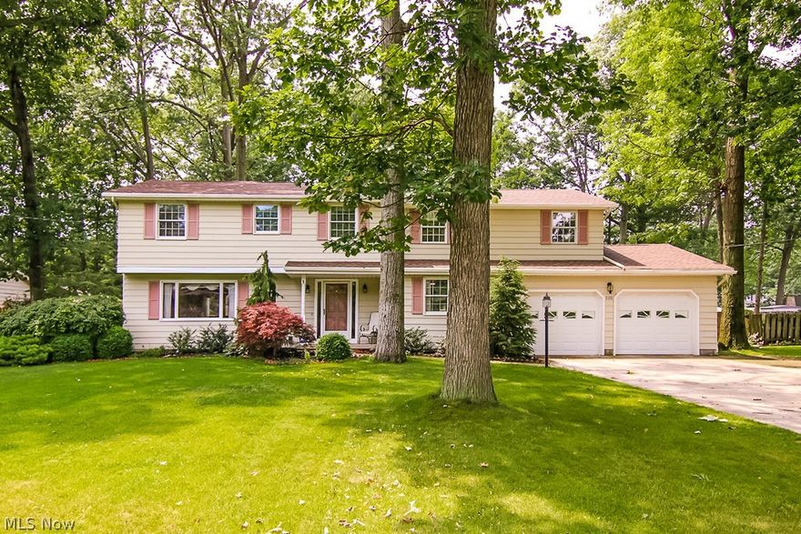 Lovely colonial on a nice sized lot! Long term owners have kept this home clean and well maintained! Great curb appeal with professionally landscaped front yard! Large living room with lots of natural lighting!  Stainless steel appliances & quartz countertops modernize the kitchen. Large family room has fireplace and laminate wood flooring and patio door leading to a beautiful vaulted sunroom! Sunroom overlooks the privacy fenced backyard complete with patio, deck, above ground pool & storage shed! Upstairs you'll find four spacious bedrooms! Natural hardwood flooring is exposed in two of the bedrooms! The master suite is 24x24 with vaulted ceilings plus a huge walk in closet, full bath w/ jetted tub and sitting area! Basement provides a finished rec/family room and lots of storage space! All appliances remain!  Noteworthy updates include roof aprox. 5 years old*, furnace/central air aprox. 1 year old*! (sq ftg provided does not reflect the sunroom) Overall, a wonderful home nestled in