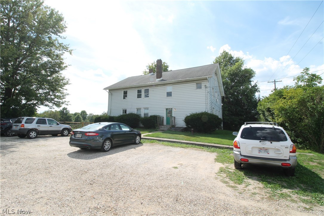 Rare opportunity to own a 4 Unit Apartment building in Brimfield, OH. Very close to Kent State. Total rents are $2525 month. Profession management in place. Currently we have one vacant unit is a three-bedroom unit available for showings. Two units have one bedroom, and one unit is a two bedroom, all with one bathroom. Laundry in the basement. Very quiet setting with a farm in the backyard. Just sit back and collect rent checks on this one.