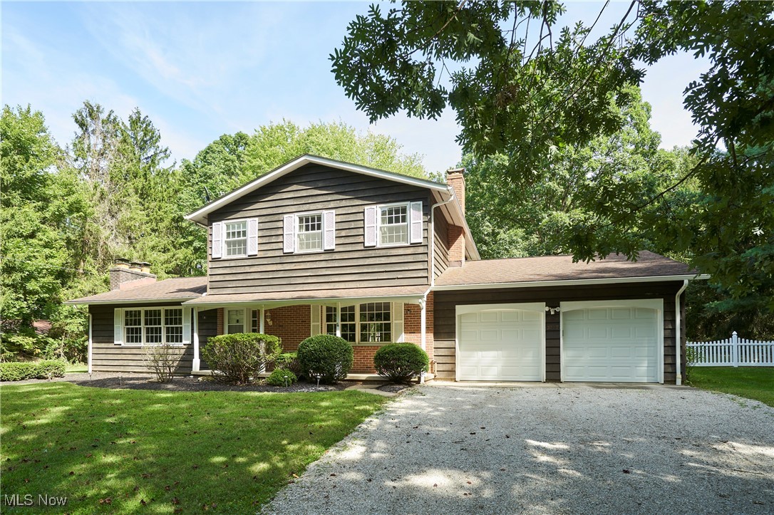 The perfect blend of country with easy access to all major highways and Medina Square. This 4 bed, 2.5 bath home sits on a picturesque and private wooded acre of land. The main floor includes a spacious family room, living room, and eat-in kitchen with newer stainless appliances, all with wood flooring. A first-floor laundry room and half bath are conveniently located off the kitchen. The living room features a gas fireplace, while the family room offers a fireplace with a wood burner. 4 beds and 2 updated baths up. A/C added in 2018.