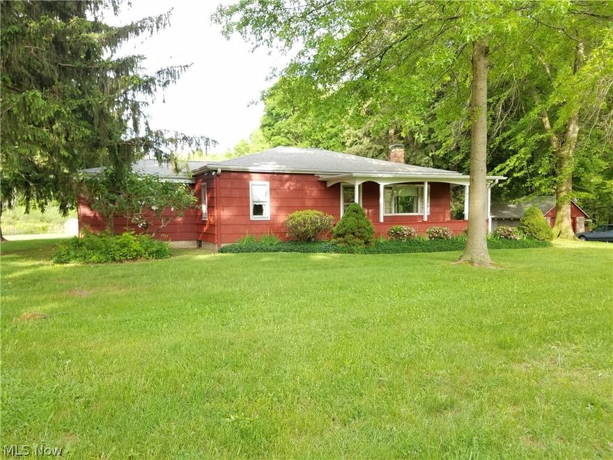 Looking for one floor living with some acreage? Look no more this solid built ranch is right for you! This ranch home has 3 bedrooms, 1 bath, full basement and large kitchen. Enjoy country living on almost 5 acres, while being close to so many amenities. The cement covered back porch is sure to please for all those summer nights. The master bedroom is large with dual cedar closets. The eat-in kitchen is large enough for a large dining room table. Hardwood floors throughout home are gorgeous and original.  Possibilities are endless on this home. With just some cosmetic updates to this home to make it your own, you will fall in love. Close to the longest cover bridge in Ashtabula County, close to interstate route 11, near Lake Erie, and close to shopping. Don't miss out on the possibilities of this home.