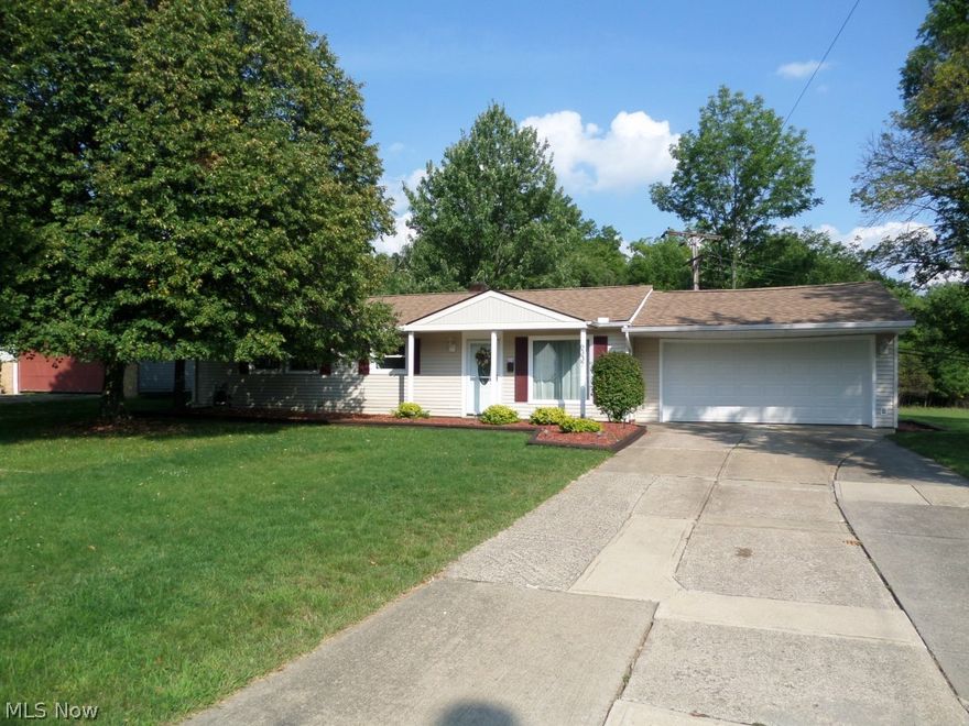 Beautifully Renovated Ranch on a Large Wooded Lot! Enjoy one level living with three separate living areas, eat-in kitchen and formal dining area. This updated house features custom painting throughout. The 2008 kitchen remodel features updated countertops, stainless steel appliances and updated backsplash. The second living space is in the back of the house, perfect for entertaining. The house also features a beautiful dining area with a wood burning fireplace. The third living space is currently being used for a weight room but can be conformed to meet your needs. The home offers a large master bedroom and two additional bedrooms with one and a half bathrooms. New Roof - 2014! Updated windows, Two car attached garage. Kitchen appliances stay. Move in Ready!