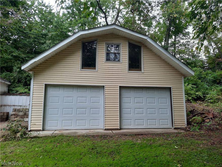 If you're looking to purchase a Lot in the Shore Acres area of Portage Lakes then you've found it!  Wait there's more...it already has a 24X24 (576 sq.ft) Garage on it that was built in 2013, perfect for your boat or vehicle storage, with a walk-up storage area!  This lot could be buildable but would require a variance.  You also could use this for summer beach or boating days because owners in Shore Acres have the option of applying for Beach access ($50) & a Dock ($350) per year. ***All information provided is deemed reliable but not guaranteed and should be independently verified*** See also MLS# 4413305 for house adjacent property.