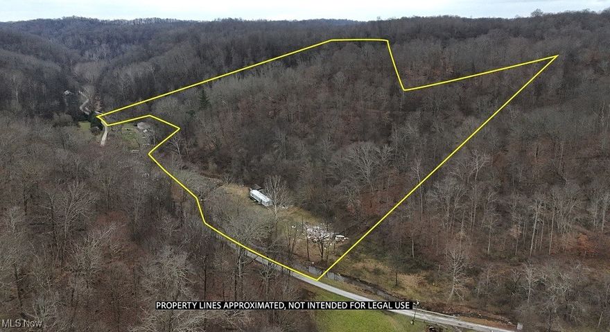 This 51 +/- acre property in Washington County, offers a fantastic opportunity for both residential and recreational use. The land features free gas, two water wells, septic, and electric already in place, making it ideal for building your dream home in a peaceful, rural setting. If you're a nature lover or hunter, this property borders hundreds of acres of Wayne National Forest on two sides, providing abundant wildlife for hunting and outdoor activities. Whether you're looking for a private residence or a hunting camp, this property is a must-see. As Mark Twain once said, "Buy Land, they're not making anymore of it!" Don’t miss this chance to own a piece of Ohio woodland!