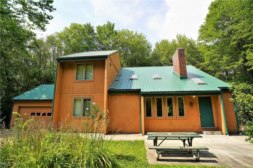 This cozy colonial with 4 bedrooms and 2 and a half baths will make you feel right at home. The home does need a few updates to make it yours. The special thing about this property is that it is zoned commercial. It has a 40x60 Outbuilding with a 12x30 office attached to it where you could run your business out of. The outbuilding has a 400 amp electrical service, 6 inch fully insulated walls,  a 10 foot garage door , and 15 foot high ceilings to accommodate your needs.