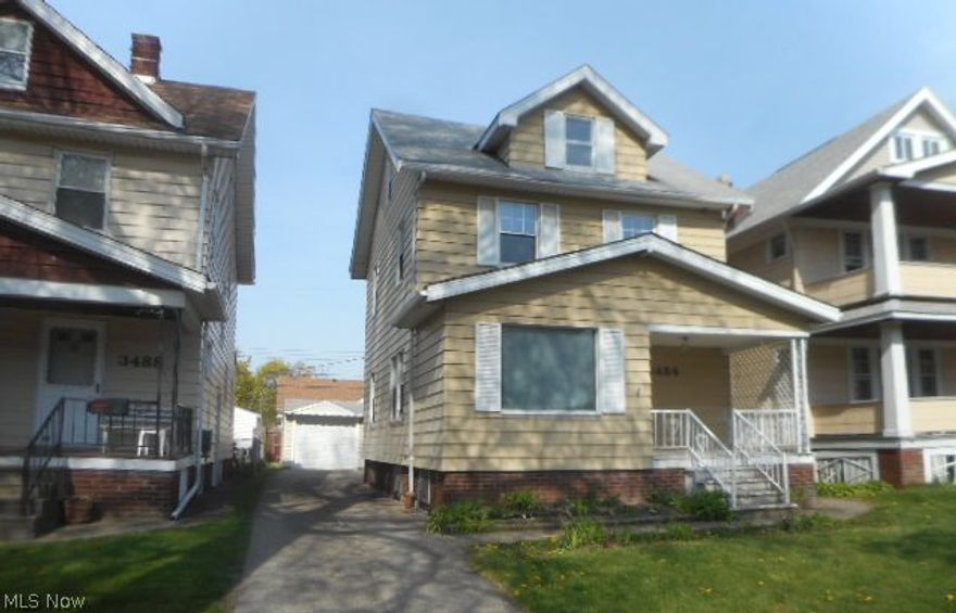 Cleveland Colonial With Enclosed Back Porch and Front Porch Features 1232 Square Feet With Full Basement. You Will Find Wood Floors In Living Room, Dining Room and 3 Bedrooms. Spacious Dining Rom With Charming Built In Bench With Storage. The Attic Area Is Finished and Could Be Additional Bedroom Or Office. Other Features Include Detached Garage and Central Air. Minutes From Downtown Cleveland!