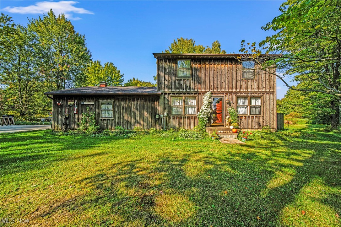 Private countryside retreat on ~2.48 acres. This 3 bedroom, 1 1/2 bathroom colonial style home sits on a quiet road with a wooded front yard, fenced in backyard, and plenty of extra space to expand, garden, or just sit and enjoy! Located in Jefferson, OH and under 5 miles to I-90 access, this is an ideal location for an easy commute! This lovely home features a nice layout with a first floor half bathroom, formal dining room with a sliding door to the deck, large living room, a full basement, and a second level with 3 bedrooms and a full bath. The kitchen has a nice large pantry, a bar seating area, and window overlooking the big backyard. There's a 2 car attached garage with electric opener. The property is scenic and private with a pond, and offers many opportunities to view local birds and wildlife. See this one right away!