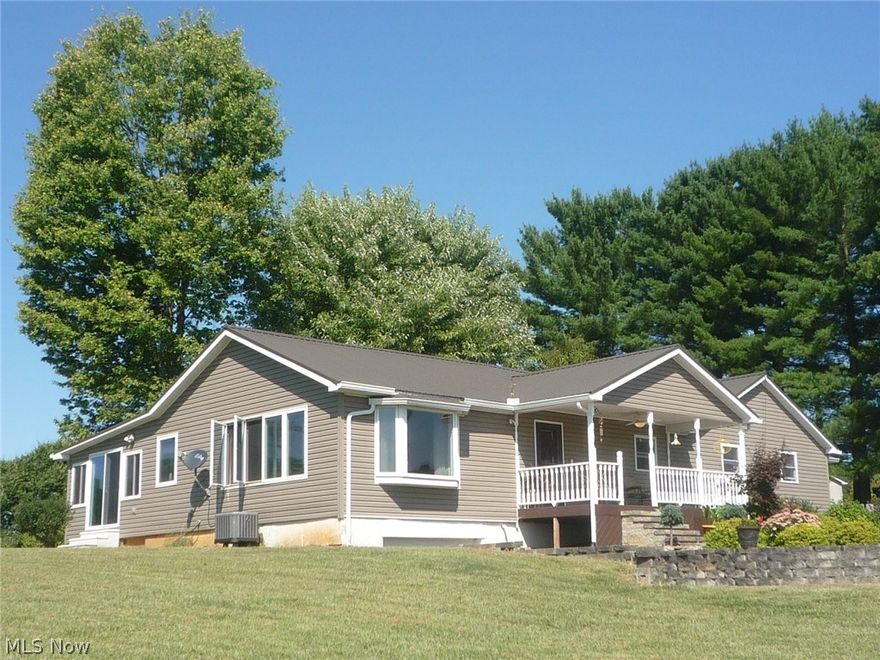 All 1 floor living! Beautifully updated 3 or 4 Bedroom/3 Bath Ranch located in a country setting on 2.2 acres, with views of the woods and rolling hills. The recently added 14x40 Great room is wall to wall windows, allowing for a variety of uses. Currently it's a dining space and TV room, just filled with natural light! the 14x18 Family room could be a 4th Bedroom (2nd Master bedroom) just by adding a door. There is a full bath and a laundry room attached to it, with access to the Great room. Could make a fantastic In-law suite. The current Master suite measures 13x17 with a walk-in closet and full bath with soaking tub. Enjoy your morning coffee off the Master BR on the covered porch. This home is like a new house with furnace, hot water tank, water softener, metal roof, siding, porch, most of the windows & kitchen counters all replaced in 2018! This home is spacious, open concept & Full of natural light. All floors are either wood, laminate or ceramic. No carpeting here! 100% move -i