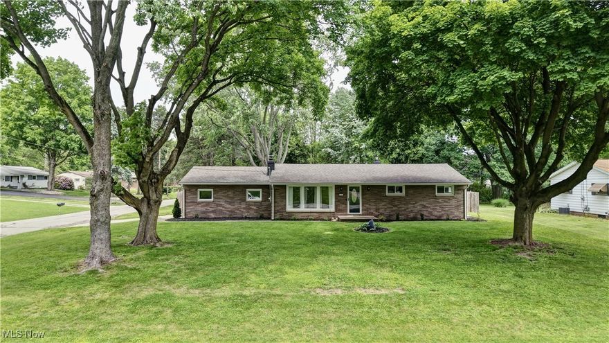 Welcome to this charming brick ranch in the heart of Jackson Township! Located minutes from shopping, restaurants, etc, you will enjoy everything this 4 bedroom and 2 bathroom house has to offer. You'll start in the bright, inviting living room with new picture windows, a gas fireplace and luxury vinyl floor that flows into the eat in kitchen. The eat in kitchen has been remodeled top to bottom with stainless steel appliances, glass tile backsplash and quartz countertops. On the first floor you will also find three bedrooms that have been freshly painted with luxury vinyl floors. The three bedrooms are accompanied by a remodeled full bathroom with tile walls and double sinks. Down in the basement you will find the laundry and storage space as well as a finished rec room with a bar, family room, the fourth bedroom with egress and a beautiful full bathroom. Outside you will enjoy the corner lot with a privacy fence and large yard!