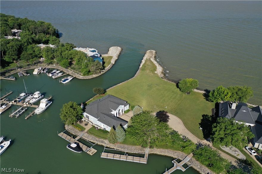 Put your toes in Lake Erie and dock at your back door on the West Side of Catawba....A Rare Opportunity to own one of the very few Residences at LeMarin Private Lakefront Homesites! Almost .6 acres with over 210' of Lake Erie frontage and over 125' of canal frontage, this amazing 1.5 lot waterfront building site is second to none. Included is a 65' dock ( water and power ) at your back door, along with space to put all your PWC toys, etc.  LeMarins deep water marina will accommodate your vessels and provide a safe harbor when Mother Nature calls. As you enter through the gated 35 acre community of Lemarin, this Building Site is located at the end of a private cul du sac with all utilities available. A truly unique and one of a kind location. Build to Suit** subject to Deed Restrictions.