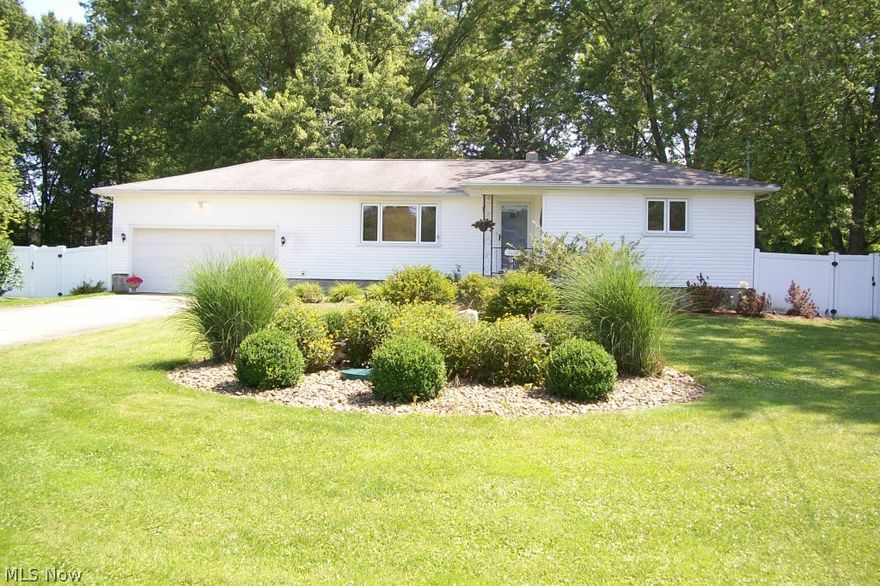 Move in ready 3 bedroom 2 bath ranch sitting on .81 acres. Oversized garage for additional storage with opener and man door for backyard access. Beautiful landscape with a backyard that features a patio and deck off of sliding doors from eat in kitchen, vinyl fence for complete privacy. Updated kitchen with  appliances that stay. Hard wood floors throughout. Fresh and clean basement with bath and possible additional living space with plenty of storage. Washer and dryer do not stay.