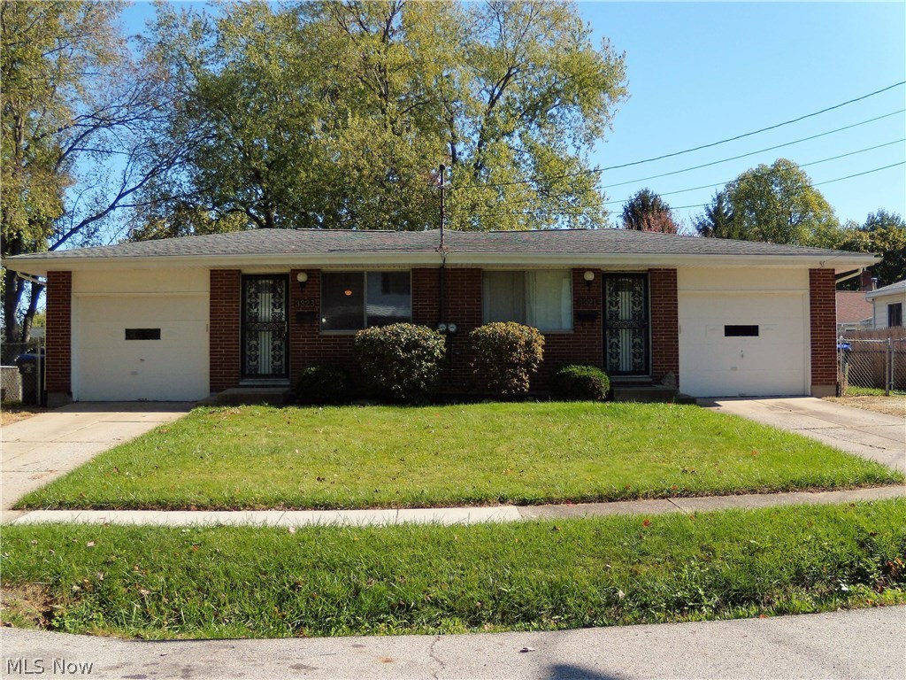 Great investment opportunity in Cuyahoga Falls! Well maintained brick ranch twinplex with 2 bedrooms and 1 bathroom in each side. The living rooms open to a large eat-in kitchen with appliances included. Separate waterproofed full basement and single car attached garages provide plenty of storage. The side yard and backyard are fully fenced in with a divider in the rear. Carpet is about 4 years old. Newer roof, gutters, and soffits. Newer furnace in unit 2 (3323) and updated electric panels in both sides. There is a long term tenant in unit 1 (3321). Unit 2 (3323) is recently vacant. Separate water, gas, and electric. Close to dining, shopping, and Route 8. Motivated seller!