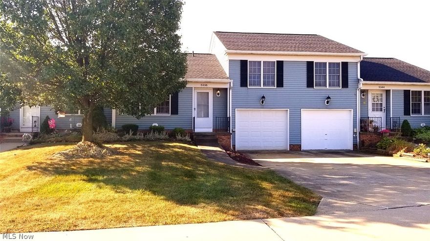 Nice Split Level Cluster Home.  Main level features open concept dining room, living room and kitchen w/ vaulted ceilings and back patio.  Second floor has bedroom, full bath, master bedroom w/ half bath and dual closets.  Lower level leads to laundry room and oversized tandem two car garage.  Easy keeper and convenient location close to highway, shopping & restaurants!