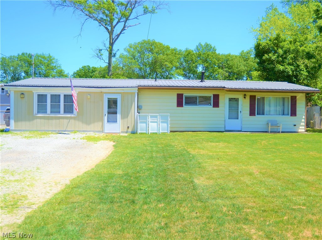 Welcome to this beauty located in Grafton with country charm! This home has so much to offer. It is located on a quiet dead end street with many updates! Once you enter this ranch you will be amazed with how spacious the living room is! The living room is freshly painted with new wood-look vinyl flooring. The kitchen is between the dining area and living room, making it perfect for the family with plenty of cabinet space, equip with all appliances that will be staying for the new home owner. The dining room has a beautiful farmhouse-look chandelier, pantry with new sliding barn door and plenty of room for your family to gather. Down the hall there are 3 bedrooms all updated with wood-look vinyl flooring. The bathroom is newly updated with great lighting and new vanity. Over to the other side of the house is the laundry room, huge closet with plenty of storage and the master with private access to the new deck with half being covered. The deck is 30x16 built in 2020! Perfect for enterta