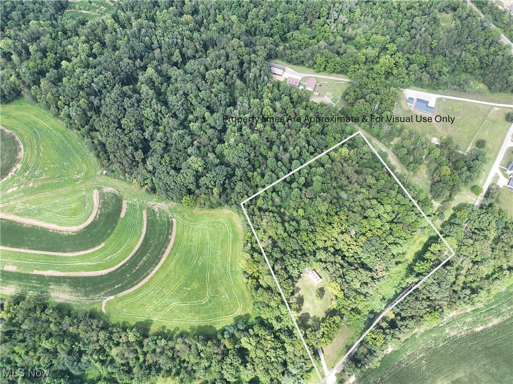 Onsite Auction September 22 at 6:00 PM!! Located under 3 miles south of Baltic this property has a lot to offer. Looking for a weekend getaway and a little honey hole to hunt this fall or a place to build your permanent home, we’ve got it. 5.86 acres mostly wooded with a nice cabin and 8’x16’ storage barn. The furnished cabin has 1 bedroom, 1 bedroom, a kitchen, and living room area. All appliances will stay, and it is set up with a new spring and tankless hot water heater, propane heat, and new battery system with 200AH lithium battery and 6000W inverter. The cabin has a new front deck and beautiful lawn as well as a fire ring and play set. The property is very well set up for hunting and has 2 raised blinds and trails throughout. Immediate hunting rights upon 10% down payment. Please call agent before walking the property.
