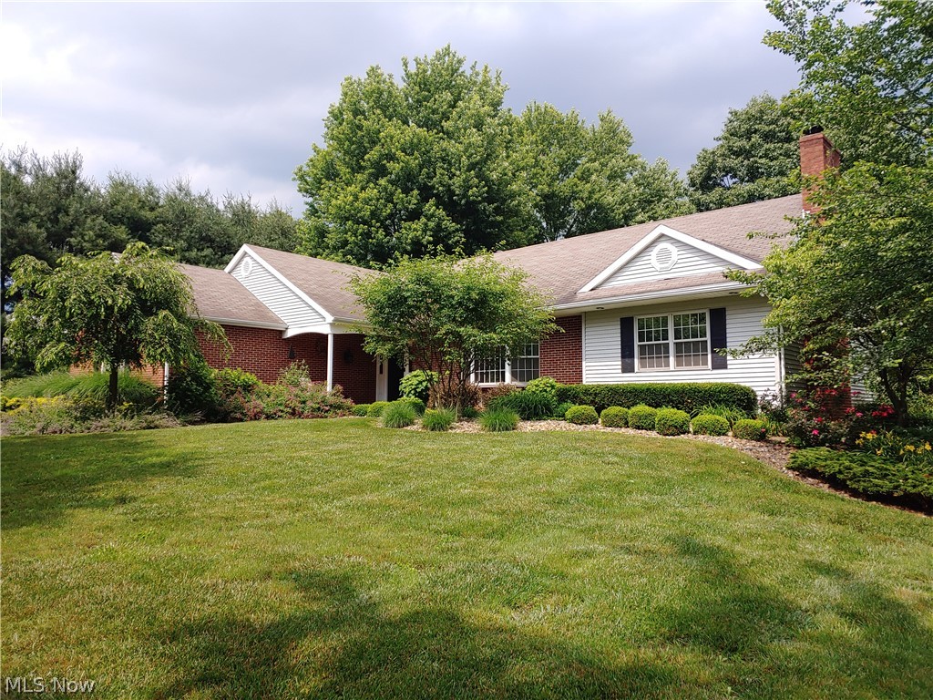 Conveniently Located Just a Mile From Interstate 70 In the East Muskingum School System is This Spacious, Nicely Updated Attractive Brick and Vinyl 4300 Finished Sq Ft ( Above Grade ) 1&1/2 Story Custom Quality Home on 3.52 Acres W/4 Bedrooms, 3 Full & 2 1/2 Baths, Craftsman Custom Built Ins are Throughout this Home, Main Floor Is a Semi Open Concept Consisting of 2 Entry Foyers, Front and Rear, Formal Living Rm W/Bay Window, Family Rm with Americana Brick Fire Place W/window Seat Flanked by Lighted Display Cabinets 4 Season SunRm with Cathedral Wood Ceiling, Tremendous Eat In Kitchen W/Center Island, Breakfast Booth, Formal Dining Area W/Lighted Hutch + Yards of Cabinetry & New Wall Oven and Microwave, Laundry Rm with Office, Master Bedrm W/Custom Built in Bureau & 2 Walk In Closets, Full Featured Master Bath W/Lighted Make Up Table. Guest Bedrm W/Private Bath & Walk In Closet, 2nd Floor Boast 2 Large Bedrms Ea W/walk In Closets. Jack & Jill Bath W/2 Vanities + Unfinished Area for