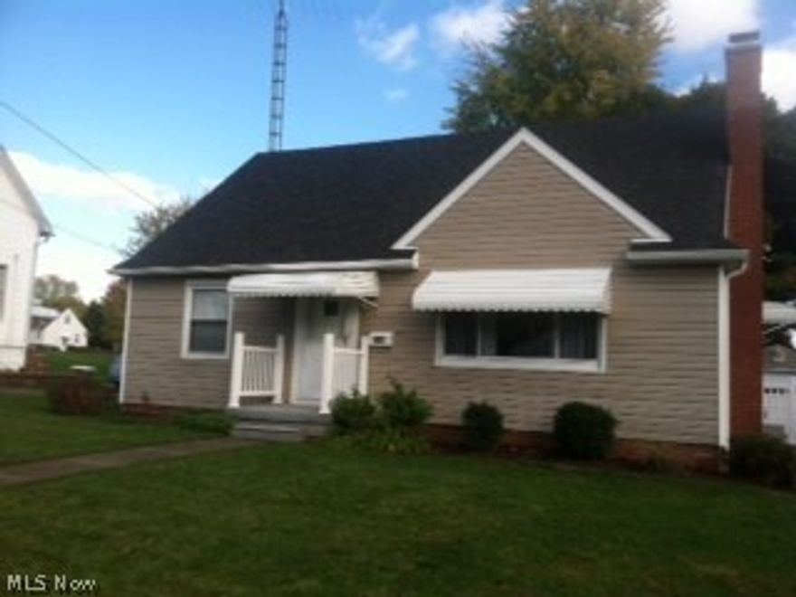 Nothing to do to this house except move right in!  This cozy bungalow has so much to offer including HWT and roof - 6 years ago, waterproofed basement this year by Ameripro with transferable warranty, glass block windows in full size, clean basement, newer windows and exterior doors, fenced in back yard, one car detached garage with door opener, beautiful rear deck through sliding glass doors in kitchen, and much more.  Home has been very well mainained.