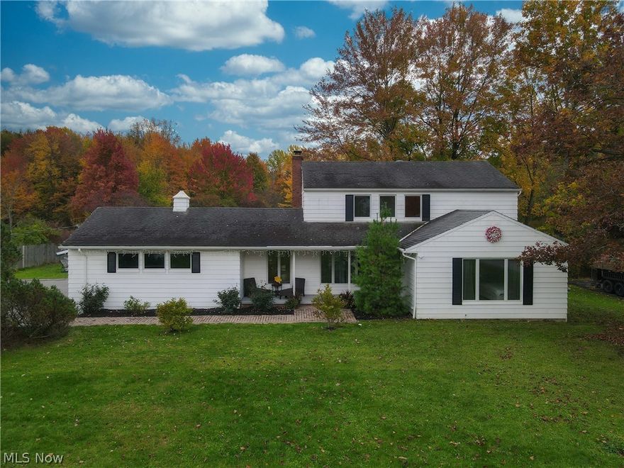 Beautiful spacious colonial with a massive entertainment deck nestled on picturesque 1.4 acre wooded lot w/ storage shed. Modern gorgeous kitchen with stainless steel appliances redone in 2018, leading to breakfast room with elegant coffee station with beautiful quarts counters. 1st Flr Master Suite.  All 3 bathrooms glamorously remodeled in 2019. Newer Tankless Gas Water Heater (2020) & A/C (2017.) Large Pella windows w/ lifetime warranty making this home light & airy. 1st level additional lounging room offers so much potential: office space, play or study room- the choice is yours! Home warranty included. ORANGE Schools.