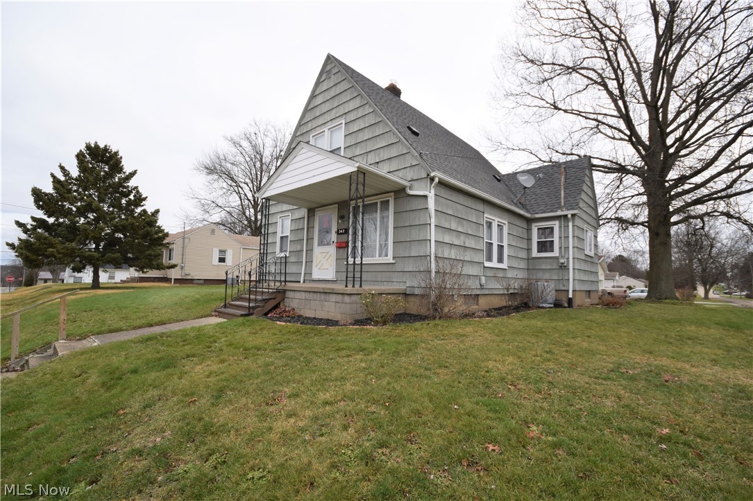 Welcome to 341 6th Street NE in Barberton! This impeccably maintained cape cod style home sits on a double corner lot and has 3 bedrooms and 1 bathroom. First floor is made up of the living room, eat-in kitchen (custom-built kitchen table stays with home if buyer desires), two bedrooms, and a full bathroom. The recently renovated bathroom has a new vanity and surround bathtub. Head upstairs to find a third, large room – perfect for another bedroom, a craft room, rec room – the options are endless! This room is partially carpeted and the rest of the floor is hardwood. This room has lots of storage space, including a large walk-in closet. The large open basement has newer paint on the walls and floor. Basement has a convenient toilet, sink and shower. The front porch offers a cozy spot to sit outside. Detached garage with walkway leading to the back door from the oversized brick driveway. Shed located next to the garage offers even more storage space. All appliances stay, including washe