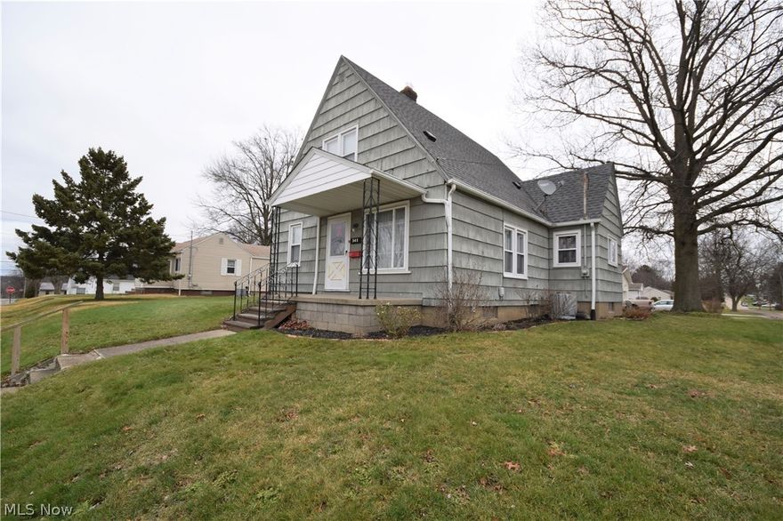 Welcome to 341 6th Street NE in Barberton! This impeccably maintained cape cod style home sits on a double corner lot and has 3 bedrooms and 1 bathroom. First floor is made up of the living room, eat-in kitchen (custom-built kitchen table stays with home if buyer desires), two bedrooms, and a full bathroom. The recently renovated bathroom has a new vanity and surround bathtub. Head upstairs to find a third, large room – perfect for another bedroom, a craft room, rec room – the options are endless! This room is partially carpeted and the rest of the floor is hardwood. This room has lots of storage space, including a large walk-in closet. The large open basement has newer paint on the walls and floor. Basement has a convenient toilet, sink and shower. The front porch offers a cozy spot to sit outside. Detached garage with walkway leading to the back door from the oversized brick driveway. Shed located next to the garage offers even more storage space. All appliances stay, including washe