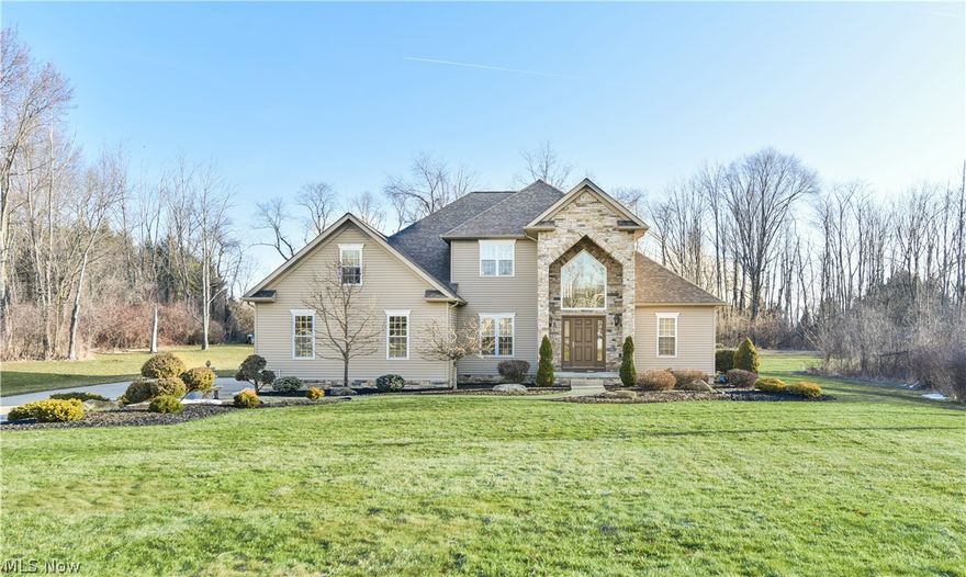 Stunning one owner custom home located in Beautiful Cherry Hills. Gourmet cherry kitchen with granite counters, island, pantry, built in china cupboard & desk, includes stainless appliances with double ovens & gas cook top.  Alluring great room with floor to Cathedral ceiling stone fireplace & built in book cases.  1st floor master bedroom with walk in closet and relaxing bath.  Impressive open foyer with winding stair case that leads you to the second floor where you will find 2 bedrooms with walk in closets, 2nd full bath, bonus room-could be a fourth BR or media room.  1st floor laundry w/chute, powder room and a home office.  Over sized finished 2 car garage with 2nd entry to basement.  13 Course basement, 2-10 Home Warranty.  Situated on a 1.3 acre private lot!