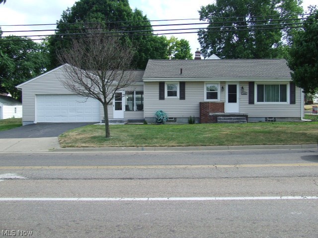 Updated Ranch would be a great starter home or perfect for downsizers! Three bedrooms and living room have polished hardwood floors and ceiling fans. Large kitchen has sunny eating area with chair-rail molding. All appliances stay. Sun room connects to kitchen and garage and provides easy access to front and back yard. Full basement has half bath and glass block windows. 2 car attached garage with opener. New hot water heater. Move-in ready!