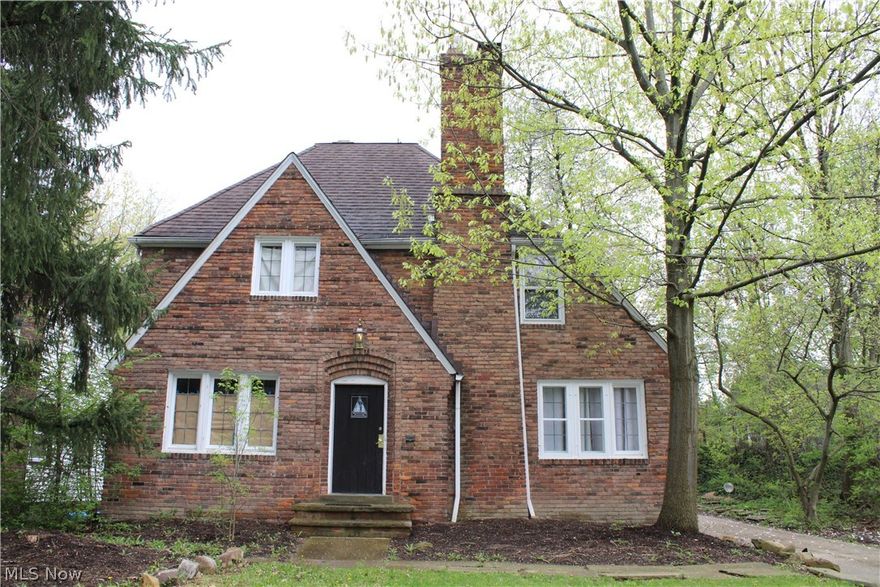 Stunning 5 bedroom Colonial completely renovated and sitting on a double lot.  This large all-brick home has all the space & desirable features and boasts an open floor plan, beautiful hardwood floors, dining room w/ built-ins, lots of natural light, gas/wood stone fireplace, study room, 1st floor bdrm w/ bath, leaded glass windows, security system, private back yard, finished 3rd floor attic, crown molding and more.  Some of the countless recent updates include granite kitchen w/ deep sink & new cabinets, new furnace, 200-amp electric panel, new rough-ins for a full bath in basement, stainless steel appliances that stay, new outlets, glass block windows, flooring/carpet & paint throughout, remodeled bathrooms, newer driveway, and more.  The basement floor has been totally replaced & the basement has been waterproofed w/ new sump pump too.  A 1-year home warranty is included for added peace of mind & paid for by the seller.  The owner renovated the home with plans of living there but n