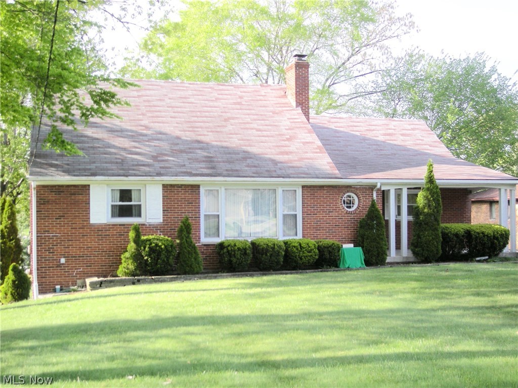 Oversized brick cape on well manicured lot, walk-out basement, large bonus room in basement, new hot water heater, newer furnace with central air, glass block windows in basement and updated windows throughout the house. House needs updating and TLC. There are foundation issues. House is being sold "as is." Owner will not make updates or repairs.