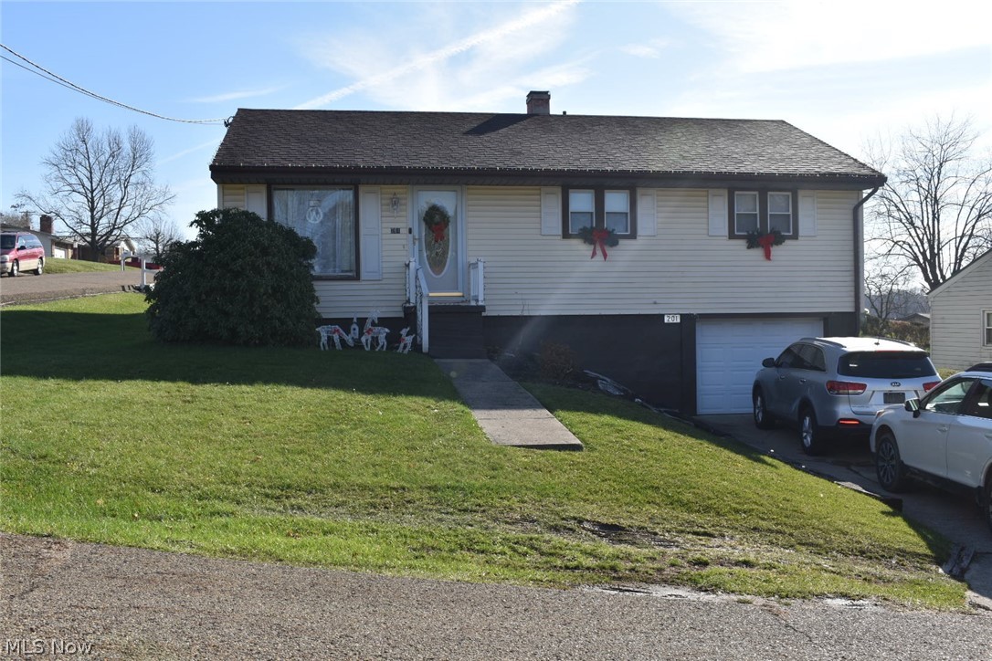 Don't miss out on this charming house! It sits on a corner lot in the heart of Carrollton. Attached garage goes right into the basement which has laundry, full bath, and plenty of space to make your own! New furnace and water heater in 2018. Upstairs you will find the kitchen, 3 bedrooms, living room, and updated bathroom with double sinks! Right off the back of the house is a covered porch that overlooks the spacious back yard. Appliances that are sold with this house include microwave, stove, dishwasher, washer, and dryer. The shed is also staying! Call today to schedule a showing!