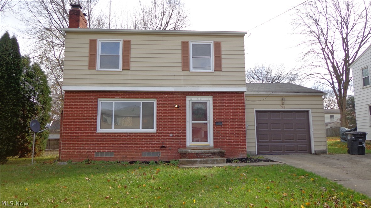 595 Treeside Dr Akron OH 44313 is a roomy home with a nice big yard. Come walk in to this renovated home that is well lit! The Living Room has a gorgeous fireplace and refinished hardwood floors that are spectacular. Enjoy family meals in the separate Dining Room yet open to the Living Room while looking out the sliding glass doors to the backyard. Speaking of the yard, it is large enough to entertain family and friends and has a grilling area with entry to the rear of the garage. Enjoy the Beautifully remodeled Kitchen with new granite countertops, stainless appliances, lavish marble look flooring and plenty of room for the chef in you. The half bath was also renovated and has beautiful flooring. Upstairs you will enter the Full Bath, again completely remodeled with all the designer colors and 3 nice sized bedrooms all with new paint and refinished hardwood. All the painting inside and out was also new as well as lighting and outlets & switches, electric panel is also good! The full s
