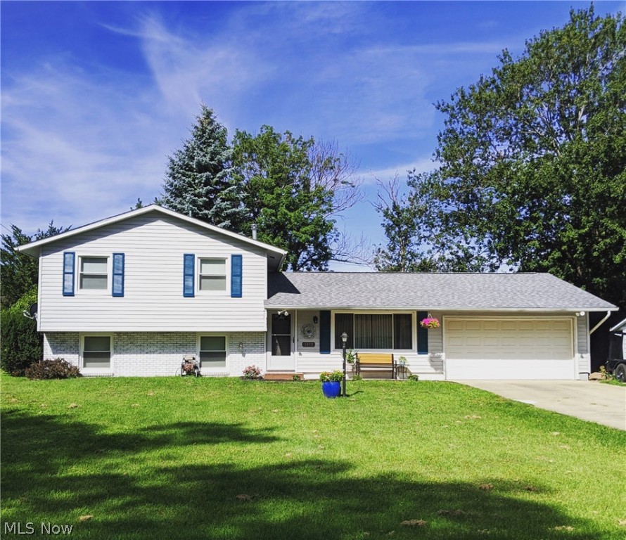 Check out this lovingly maintain 3 bedroom 1.5 bath split level in a desirable North Madison neighborhood. Updated kitchen with newer appliances, new electrical panel in 2013, new roof in 2019, tank less water heater w/water conditioner. This property offers a spacious backyard with patio, storage shed along with a delicious apple tree! There’s a breakfast bar in the kitchen with under counter lighting. 2 car attached garage, concrete driveway, Newer windows and a welcoming new front door!!! This home is only a walk away to parks, tennis and Lake Erie sunsets!Appliances stay including washer and dryer.