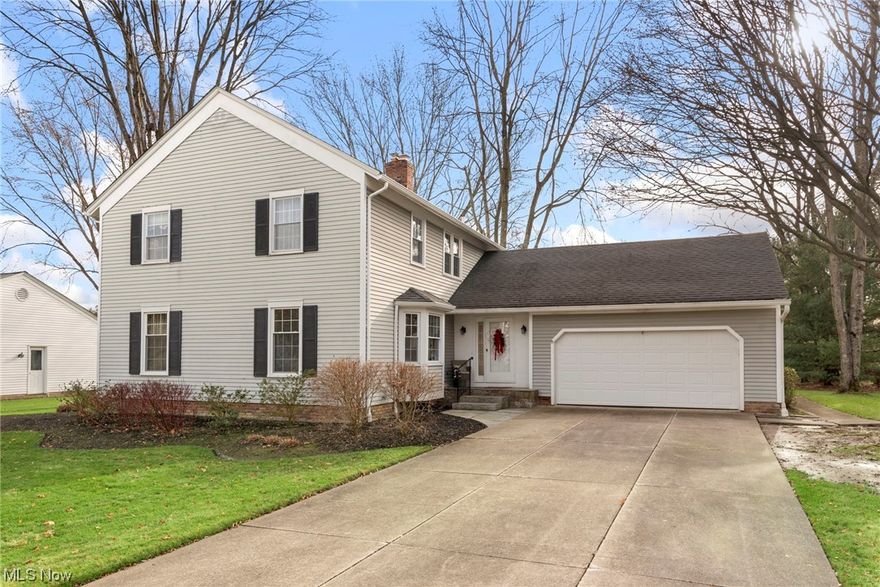 Welcome to this completely move in ready classic colonial style home in prime Solon. This property has been meticulously maintained over the years. Hardwood floors welcome guests in the foyer and flow throughout living room, dining room, and kitchen. The spacious eat-in kitchen feels like the heart of this home with an open floor plan that combines with the family room w/ wood burning fireplace. It comes fully equipped with stainless steel appliances, granite countertops, and butcher block center island. Sliding glass doors connect this main living space to the a roomy Trex deck, perfect for outdoor dining and entertaining in the large, shady backyard. The 4 bedrooms are all spacious and filled with natural light. This lovely home is situated in a beautiful, walkable neighborhood and is close to top-rated schools, and community park and recreation center.