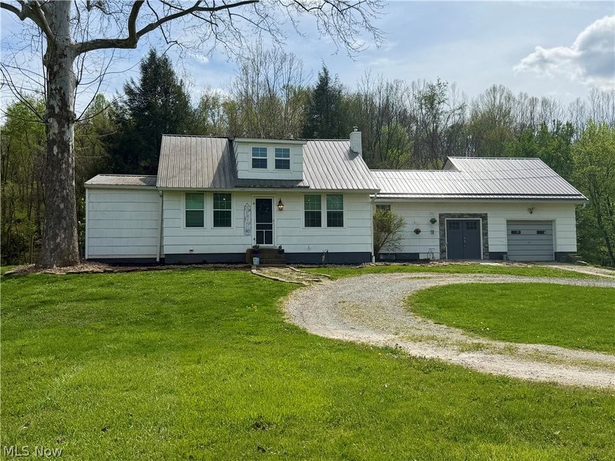 Discover this 32+ acre equestrian property in the Warren School District, offering the perfect blend of country living, modern updates, and income potential. This charming home features an open-concept layout with exposed wood beams, rustic finishes, and abundant natural light. The updated kitchen includes a farmhouse sink, stainless steel appliances, subway tile backsplash, and large island with seating—perfect for entertaining. The primary suite offers a spa-like bathroom with a clawfoot soaking tub, tiled walk-in shower, and generous closet space. A loft area provides flexible living or guest space, with hardwood floors and warm finishes throughout. Major upgrades include a tankless water heater, central vacuum system, and modern plumbing manifold for efficiency and convenience. Outside, enjoy a 50x65 horse barn with tack room, ideal for equestrian use, livestock, or hobby farming. The property also includes a separate house trailer, offering guest quarters, rental income, or multi-generational living options. With rolling acreage and wooded surroundings, this property is perfect for horse lovers, hobby farmers, or those seeking a private rural​​‌​​​​‌​‌​​​‌‌​​​‌‌‌​​‌​​‌‌​​​​ retreat.