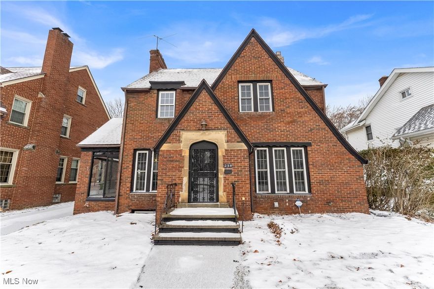 Beautifully updated brick home with excellent curb appeal in the heart of Euclid, OH—close to Lake Erie, shopping, and top amenities! Step inside to a bright living room with refinished hardwood floors, natural wood trim, and a gorgeous fireplace with mantel! The dining room features natural wood built-in shelving for display and storage! The chef’s kitchen boasts shaker white cabinets, granite countertops, subway tile backsplash, tile flooring, and stainless steel appliances including fridge, stove, microwave, and dishwasher! A convenient half bath is just off the kitchen! The enclosed sun porch with floor-to-ceiling windows offers a bright space for relaxing or entertaining year-round!

Upstairs are three spacious bedrooms filled with natural light! The fully finished third floor adds a fourth bedroom with LVP flooring—perfect for a home office, guest suite, or playroom! The renovated main bathroom features his-and-hers vanities, tile flooring, ceramic tub surround, updated light fixtures, and ample natural light!

The finished rec-side basement adds living space with LVP flooring and a cozy fireplace! Enjoy the large rear yard with a spacious deck perfect for summer entertaining, plus a playground that conveys! A detached 2-car garage provides ample storage!

Additional updates include newer vinyl windows, a younger roof, updated light fixtures, and a newer boiler! This move-in-ready home combines modern updates, functional spaces, and a prime Euclid location—an ideal opportunity for families seeking comfort, style, and convenience! Don’t miss your chance to call this gem your home! Schedule a showing to see it for yourself!